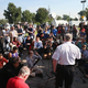 Standing in the parking lot of a gas station in Ferguson, Mo., that was burned during rioting, Ferguson Police Chief Thomas Jackson on Aug. 15, 2014, announces the name of the Ferguson police officer responsible for the shooting death of teenager Michael Brown.
Scott Olson/Getty Images
